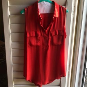 Orangey red silk looking polyester blouse with soft knot back.